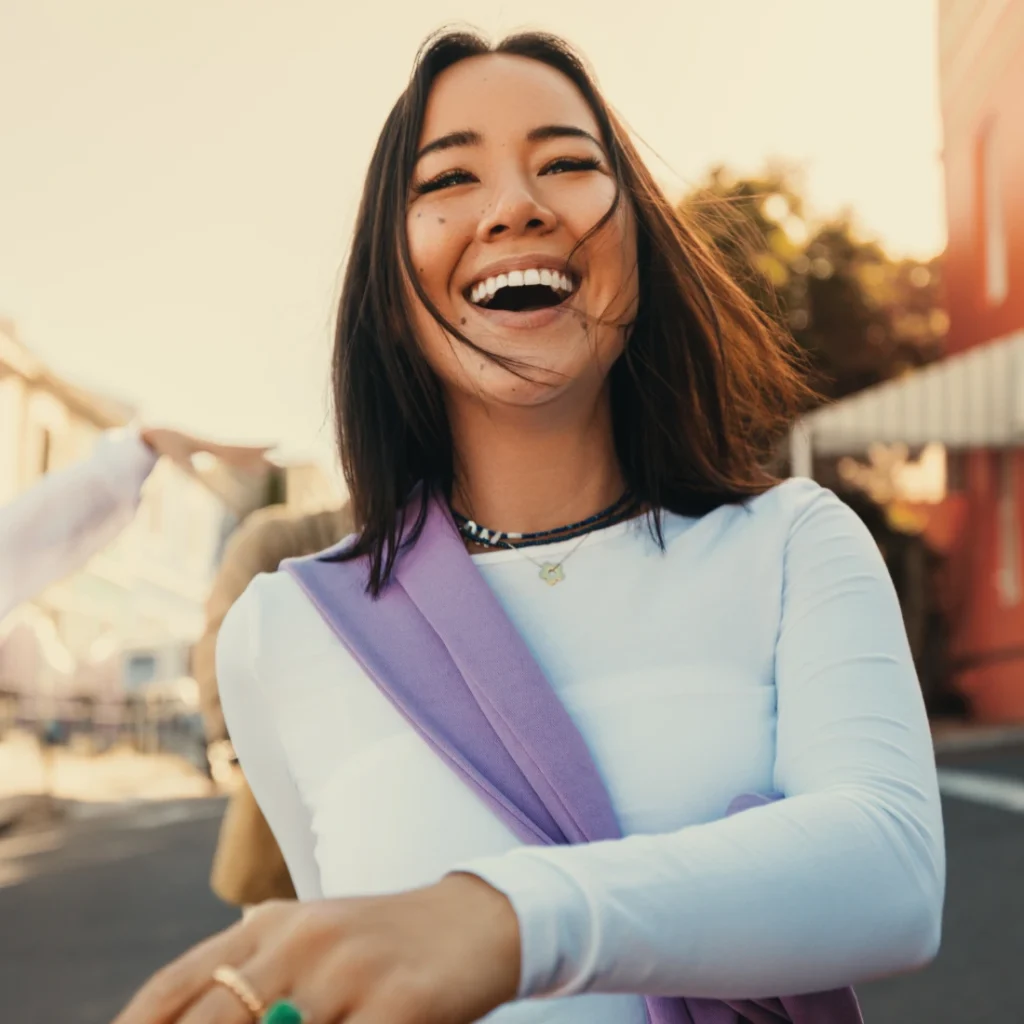 Woman smiling outdoors